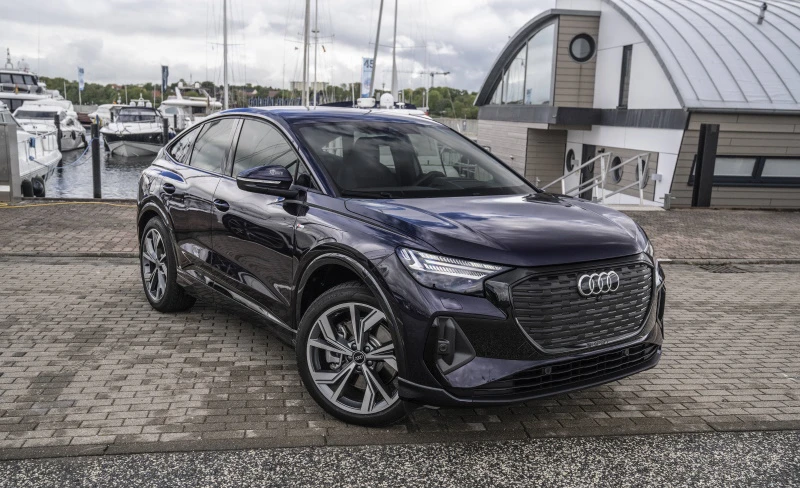 Audi Q4 Sportback 40 e-tron in Aurora Violett with black optics by Auditography
