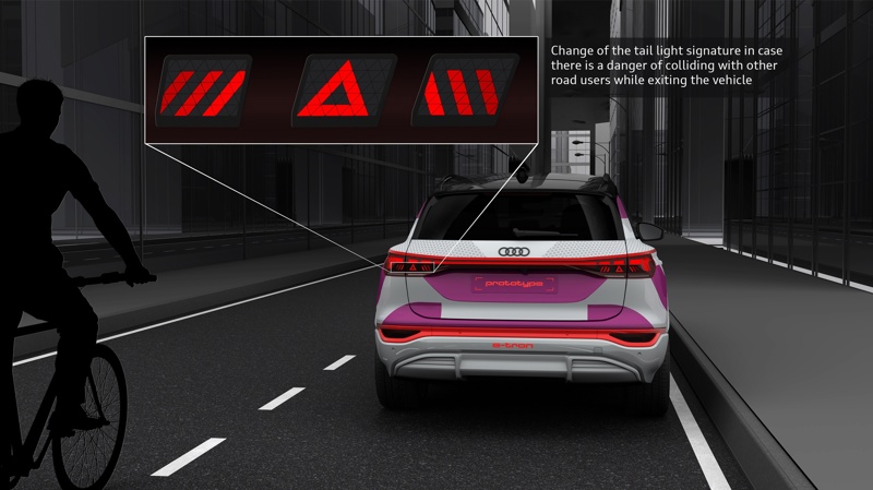 Audi Q6 e-tron med utgångsvarning på bakljusen